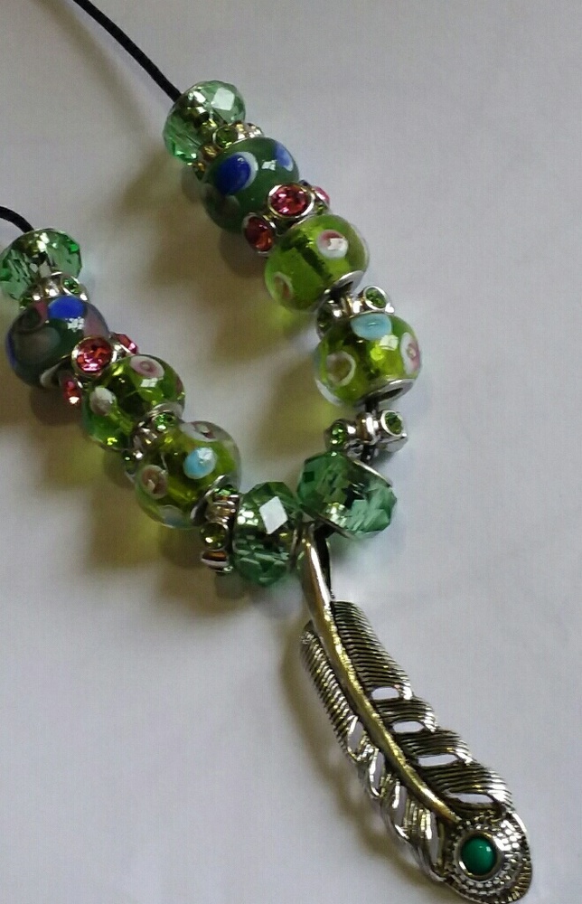 Green beaded feather